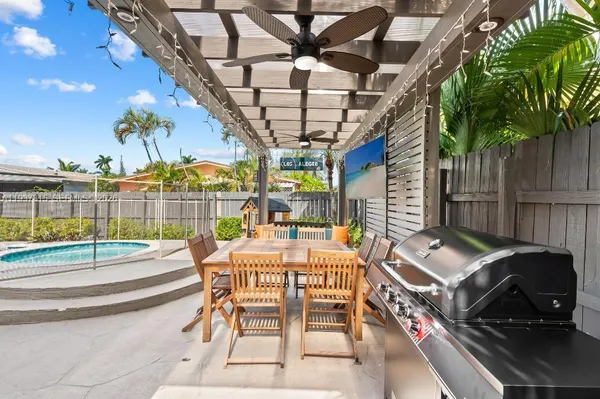 a view of a chairs and table in the terrace