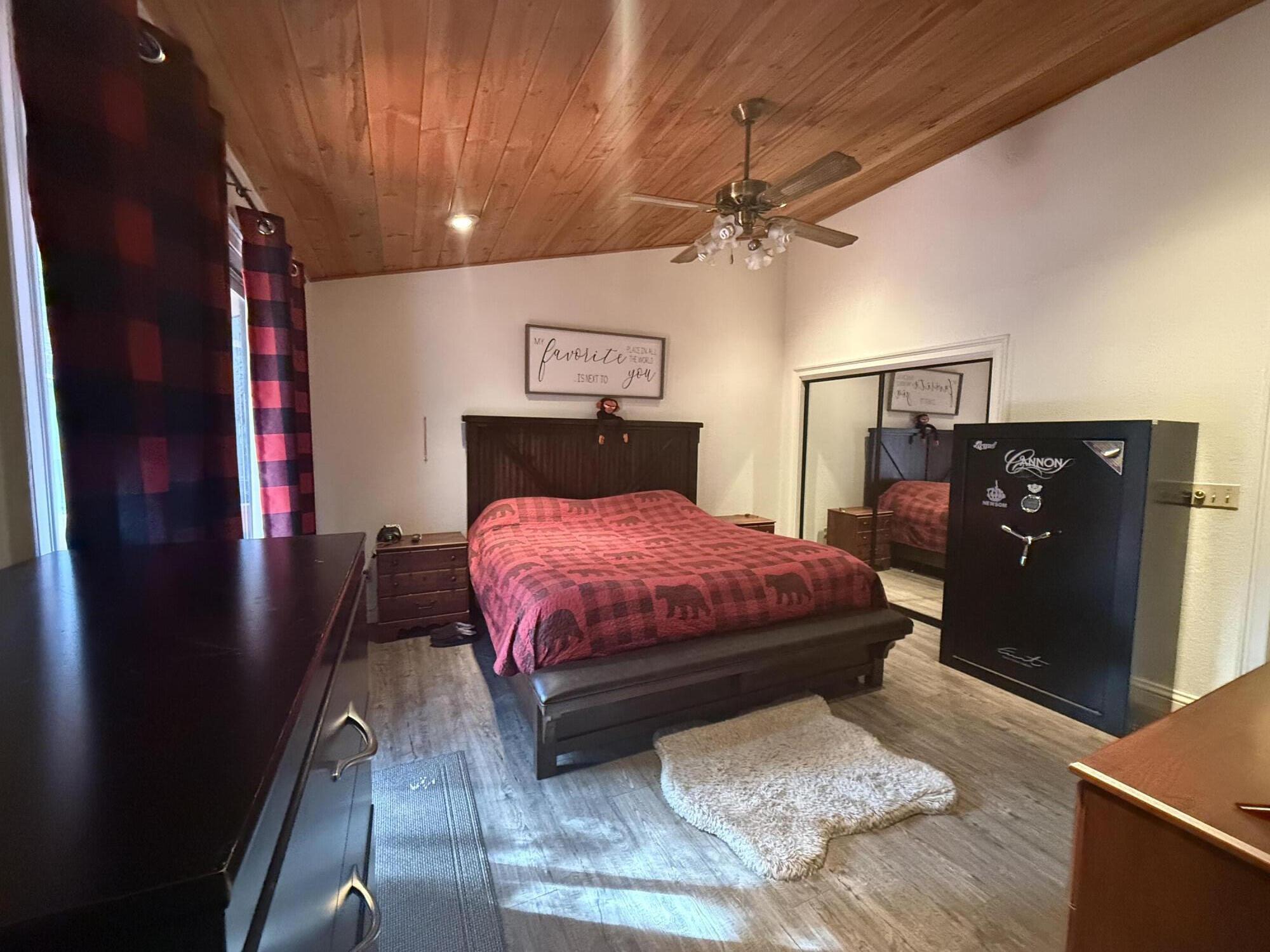 7097 Shasta Forest Drive Shingletown, CA 96088 - Photo 21 of 44 a bed room with a bed