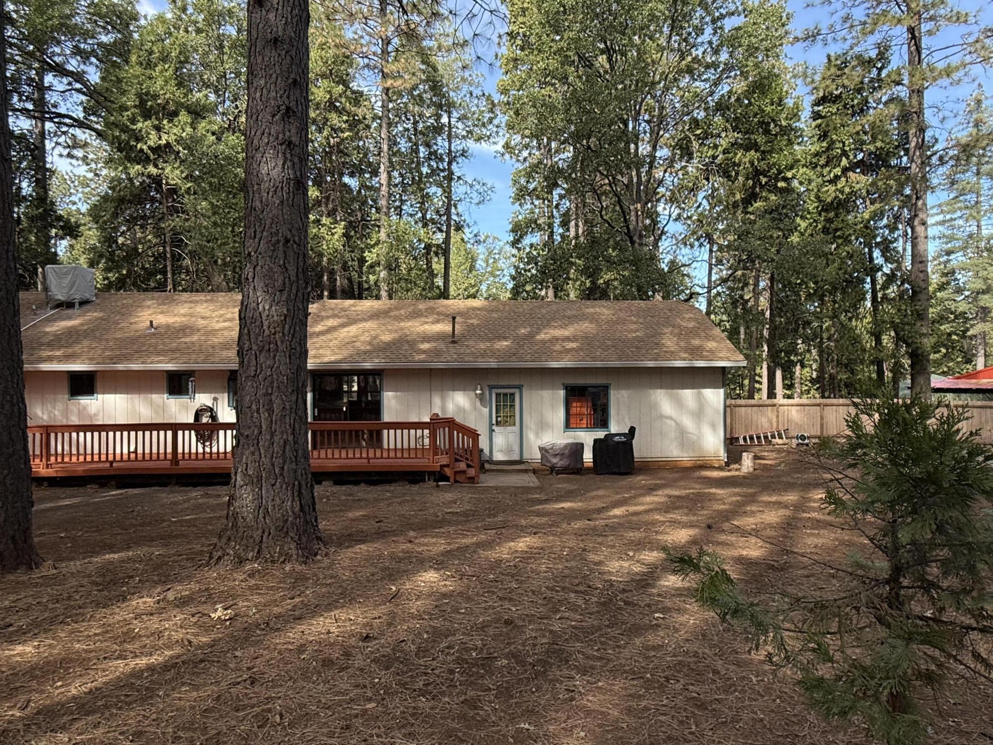 7097 Shasta Forest Drive Shingletown, CA 96088 - Photo 29 of 44 a view of a house with a yard and tree s
