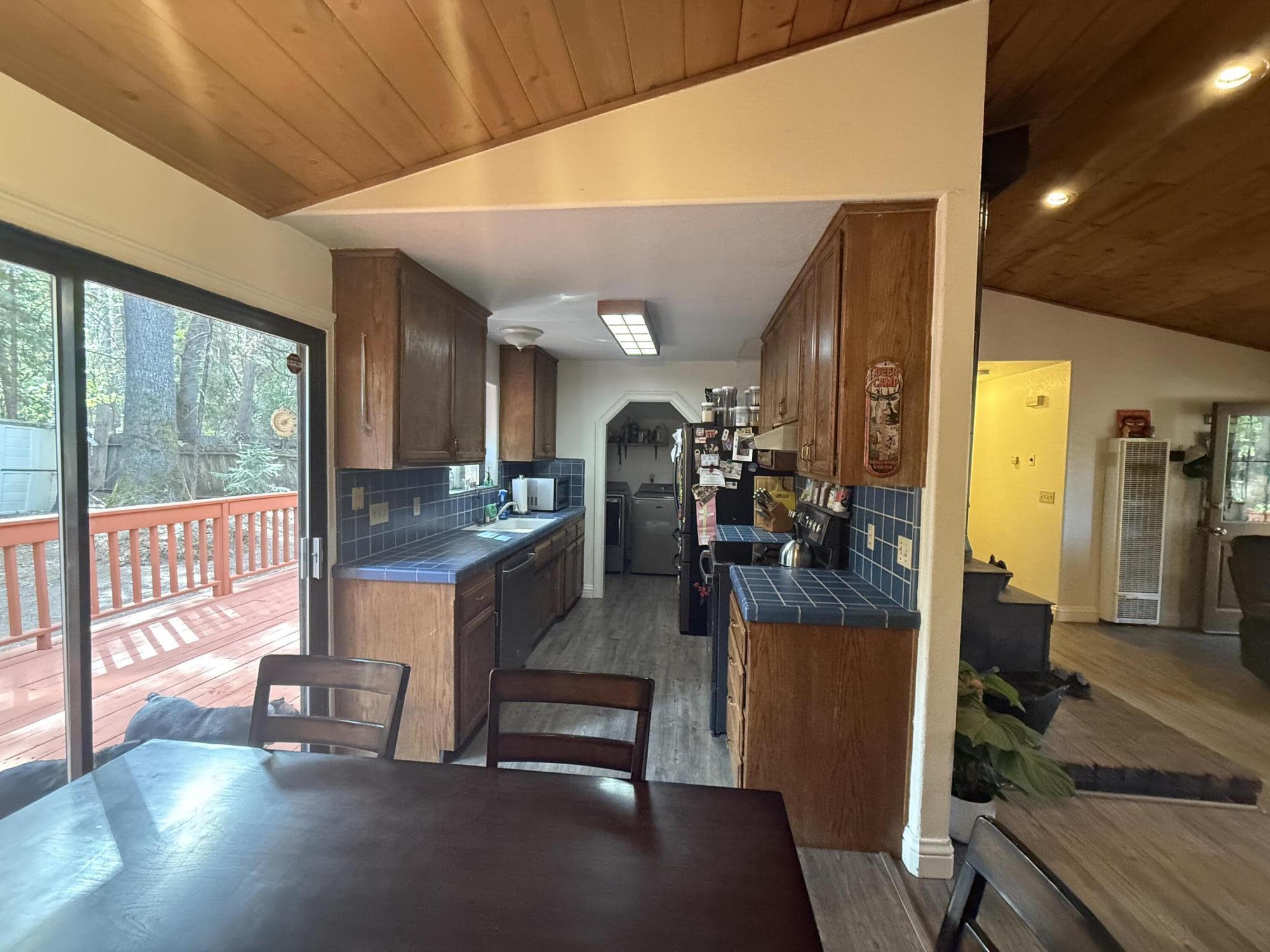 7097 Shasta Forest Drive Shingletown, CA 96088 - Photo 9 of 44 a view of a living room and dining room