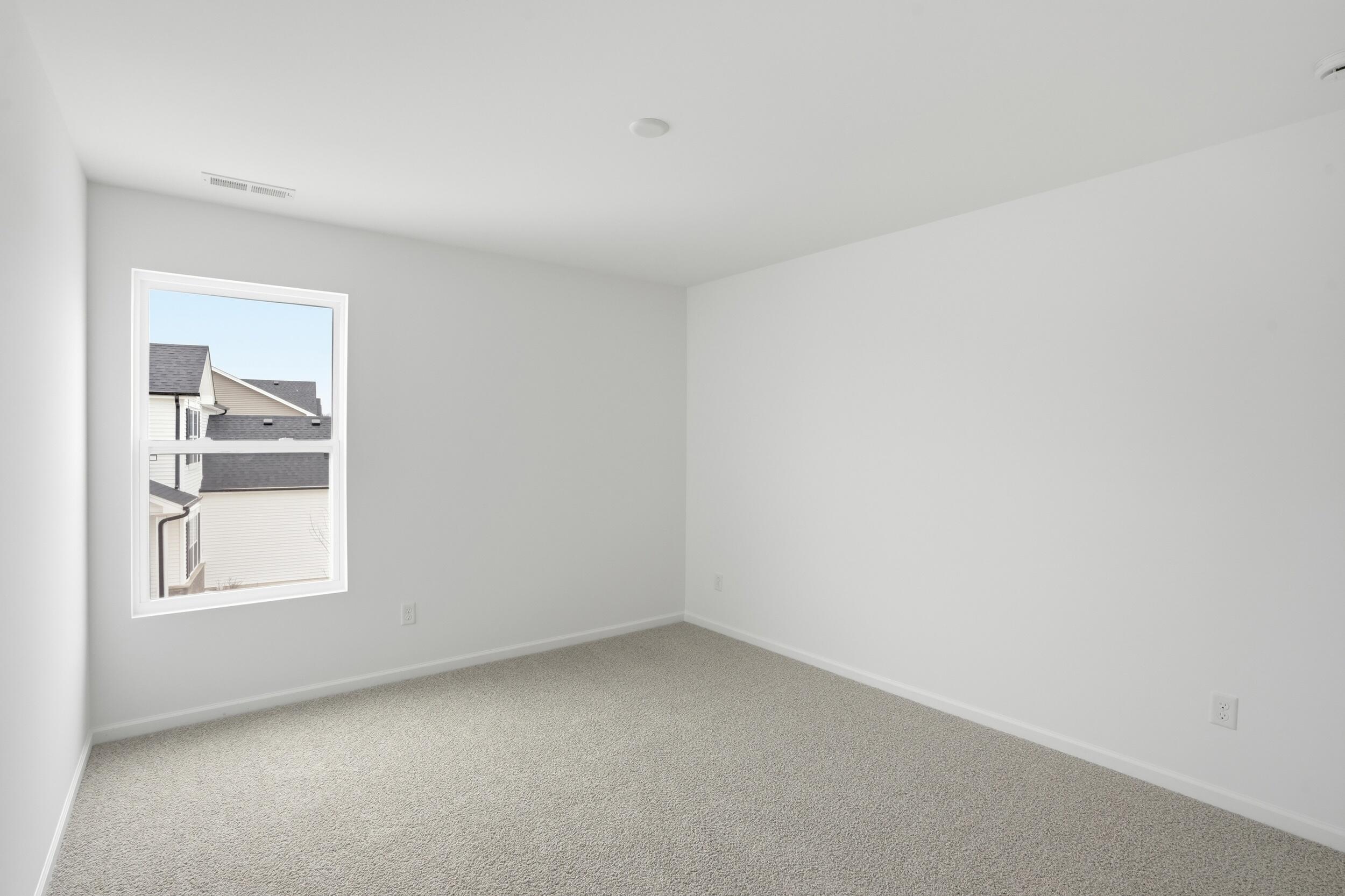6587 East 104th Avenue Winfield, IN 46307 - Photo 26 of 34 an empty room with a window