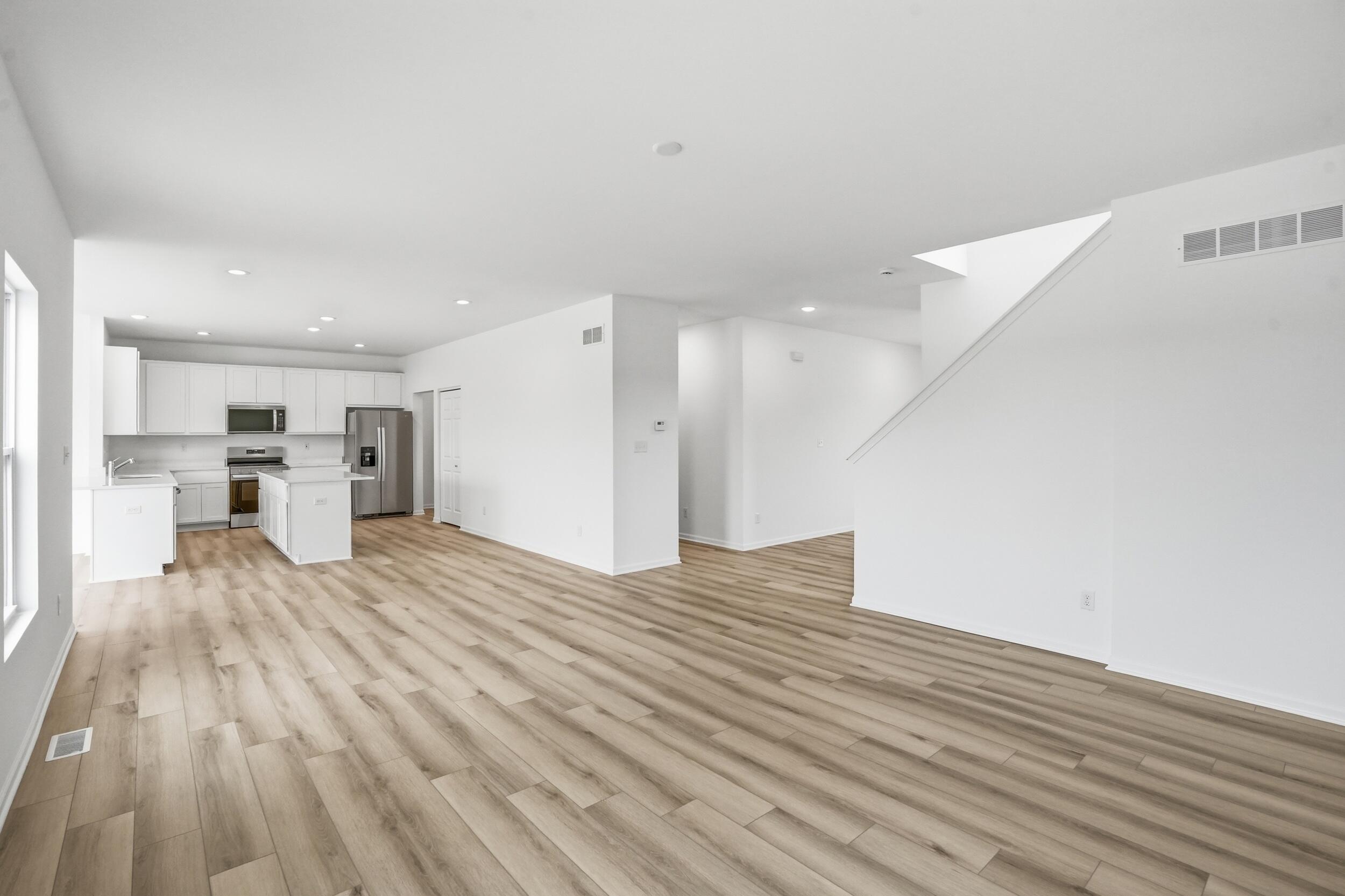 6587 East 104th Avenue Winfield, IN 46307 - Photo 6 of 34 a view of kitchen and utility room