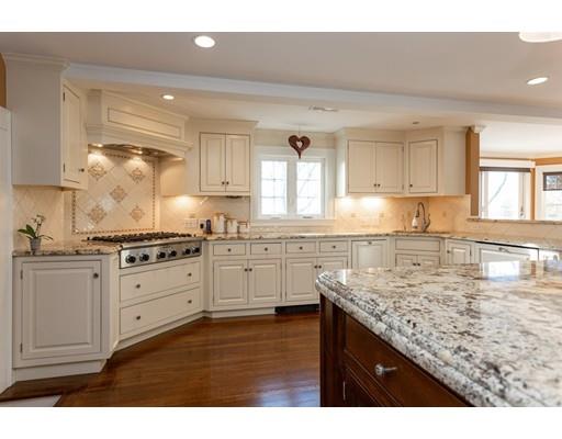 158 Hillcrest Road Needham, MA 02492 - Photo 3 of 25 a kitchen with granite countertop a sink cabinets and window