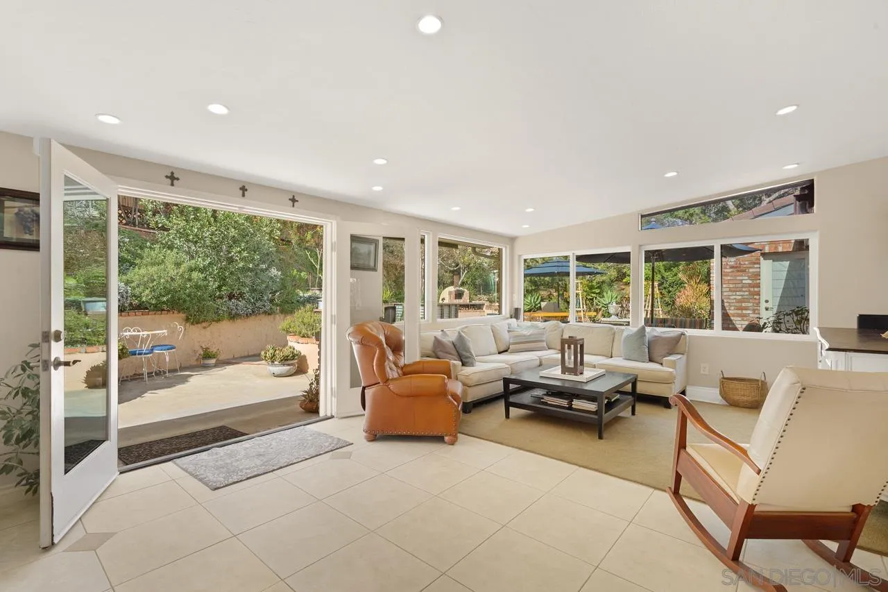 11116 Morning Dove Road Lakeside, CA 92040 - Photo 15 of 60 a living room with furniture and large windows