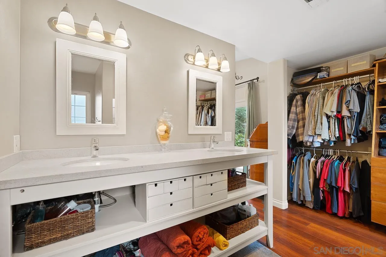 11116 Morning Dove Road Lakeside, CA 92040 - Photo 19 of 60 a bathroom with a sink double vanity and a mirror