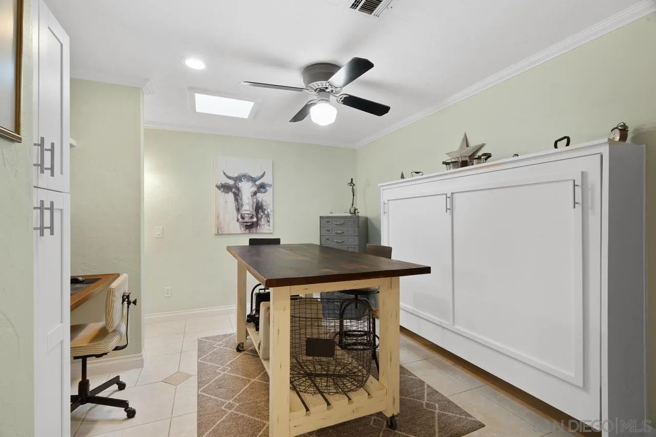 11116 Morning Dove Road Lakeside, CA 92040 - Photo 21 of 60 a view of a hallway with washer and dryer