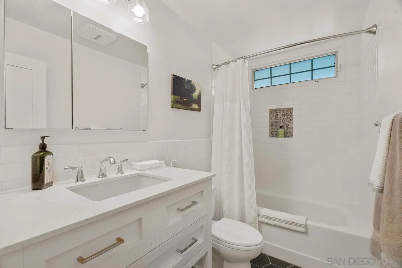 11116 Morning Dove Road Lakeside, CA 92040 - Photo 26 of 60 a bathroom with a sink a toilet and shower