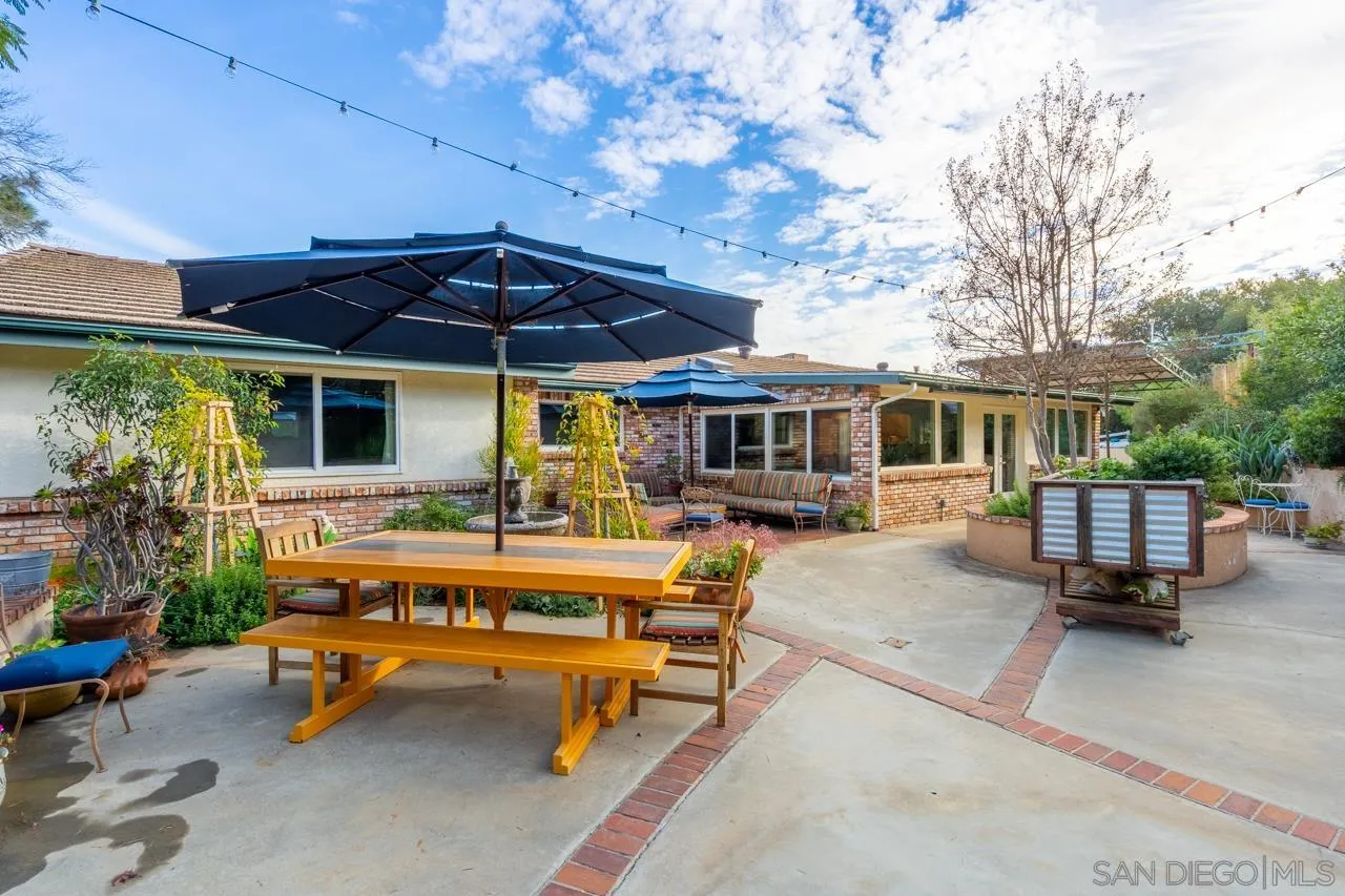 11116 Morning Dove Road Lakeside, CA 92040 - Photo 32 of 60 a view of a house with backyard porch and sitting area