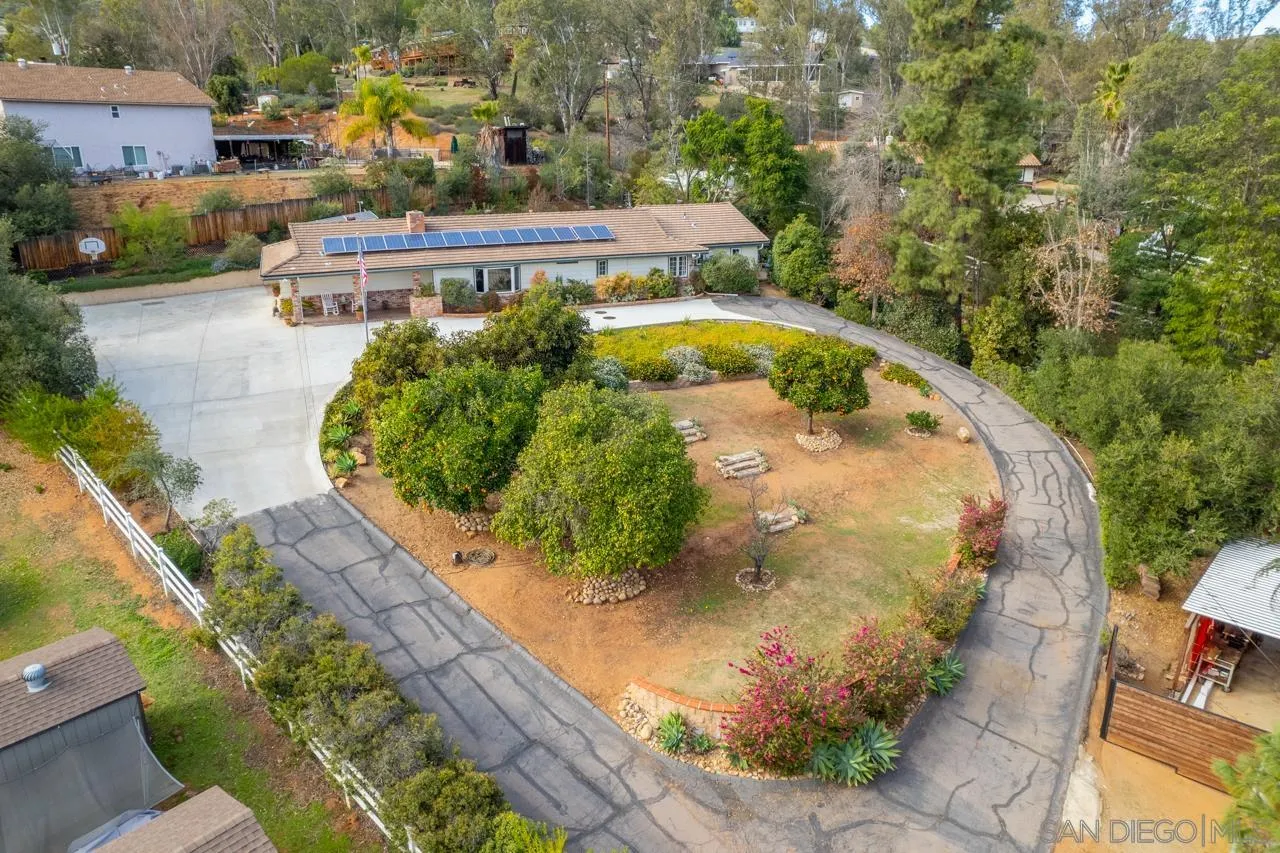 11116 Morning Dove Road Lakeside, CA 92040 - Photo 42 of 60 a view of a swimming pool with sitting area