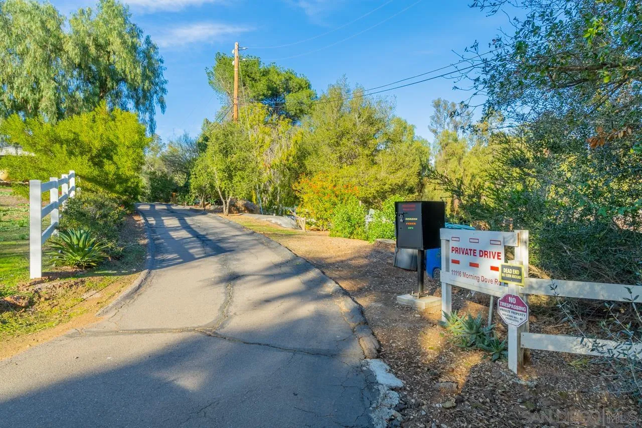 11116 Morning Dove Road Lakeside, CA 92040 - Photo 47 of 60 a view of a pathway with a bench