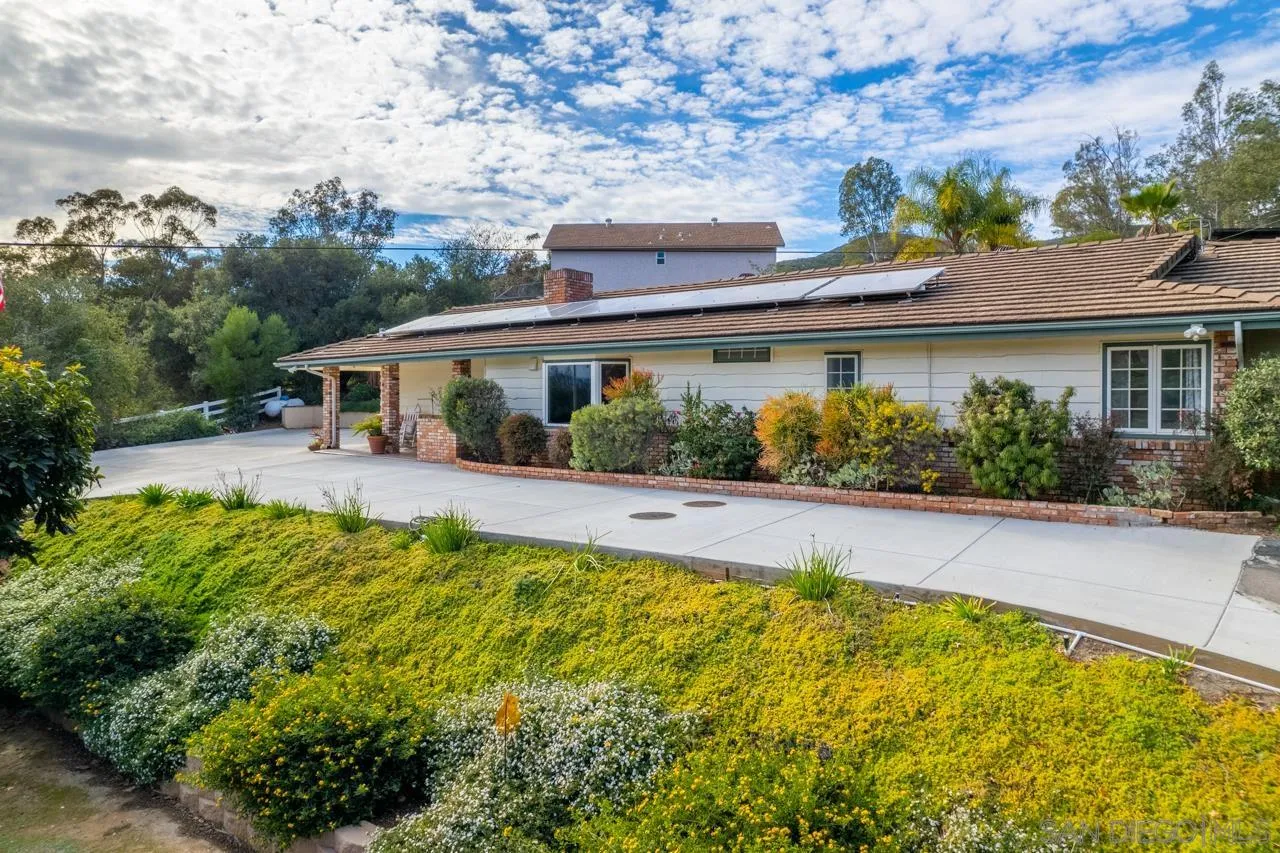 11116 Morning Dove Road Lakeside, CA 92040 - Photo 5 of 60 front view of a house with a swimming pool