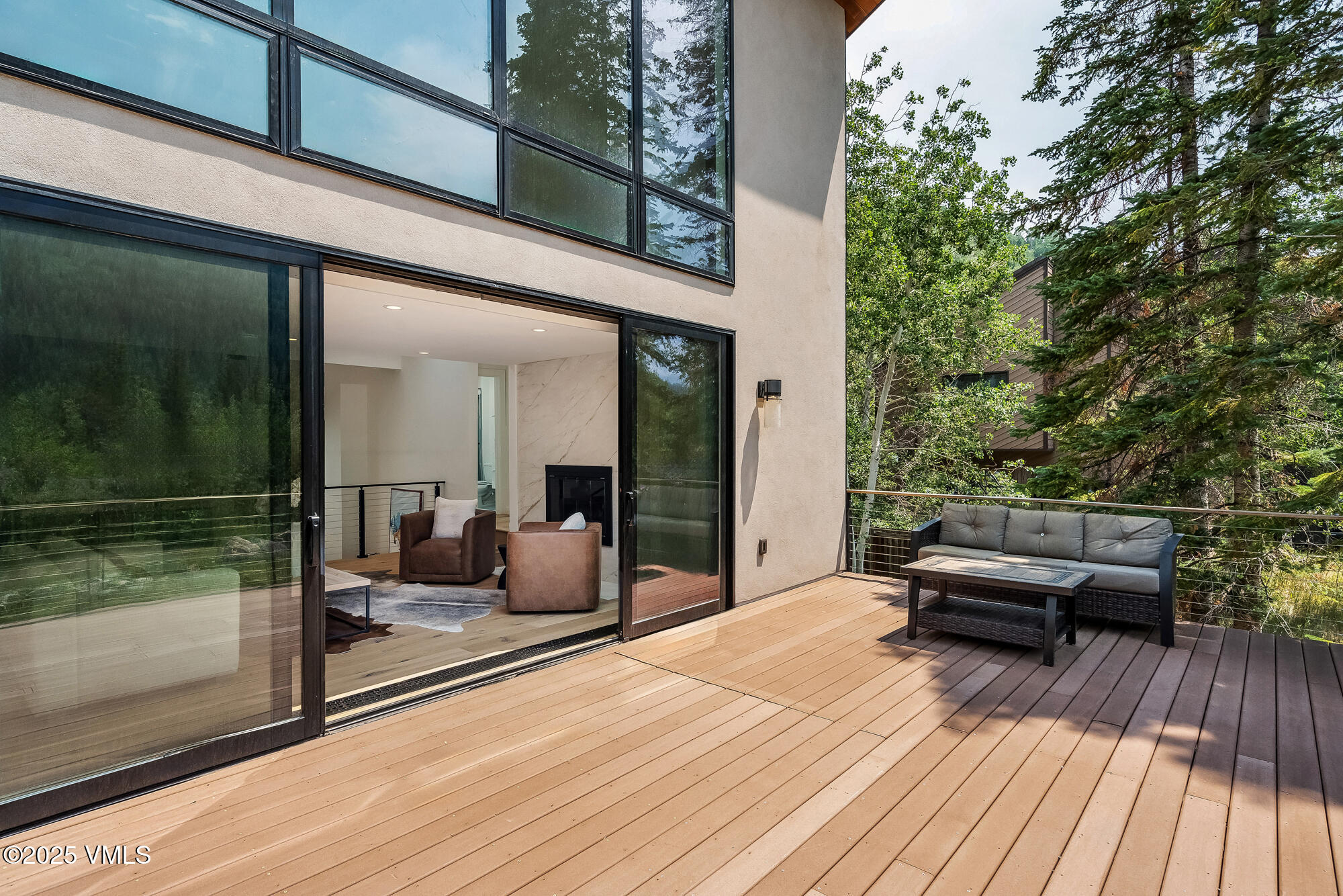 4545 Big Horn Road Vail, CO 81657 - Photo 8 of 49 a balcony view with a couch