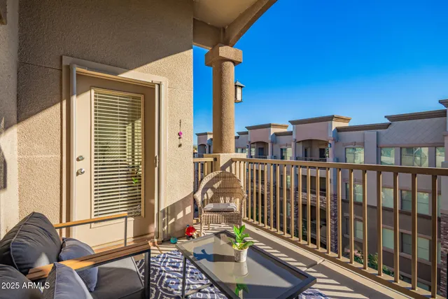 a view of balcony with a potted plant