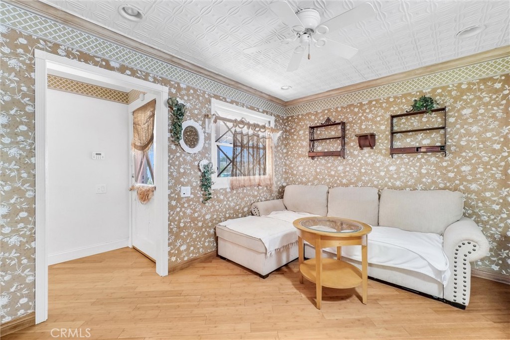 440 Cabrillo Street Costa Mesa, CA 92627 - Photo 12 of 36 a living room with furniture and wooden floor