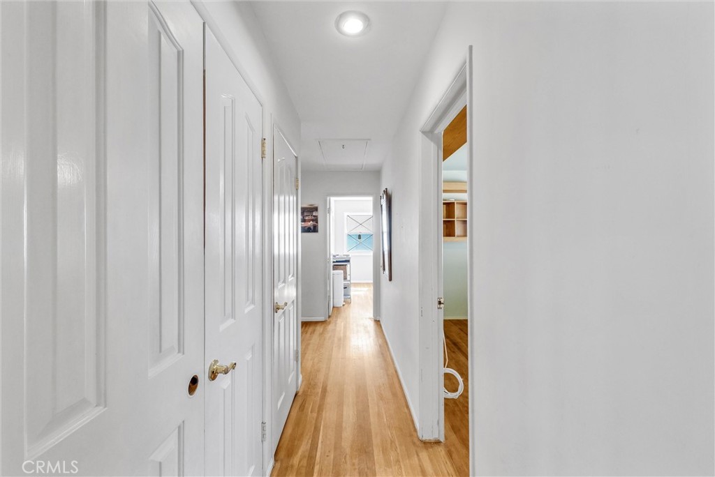 440 Cabrillo Street Costa Mesa, CA 92627 - Photo 18 of 36 a view of a hallway with wooden floor and staircase