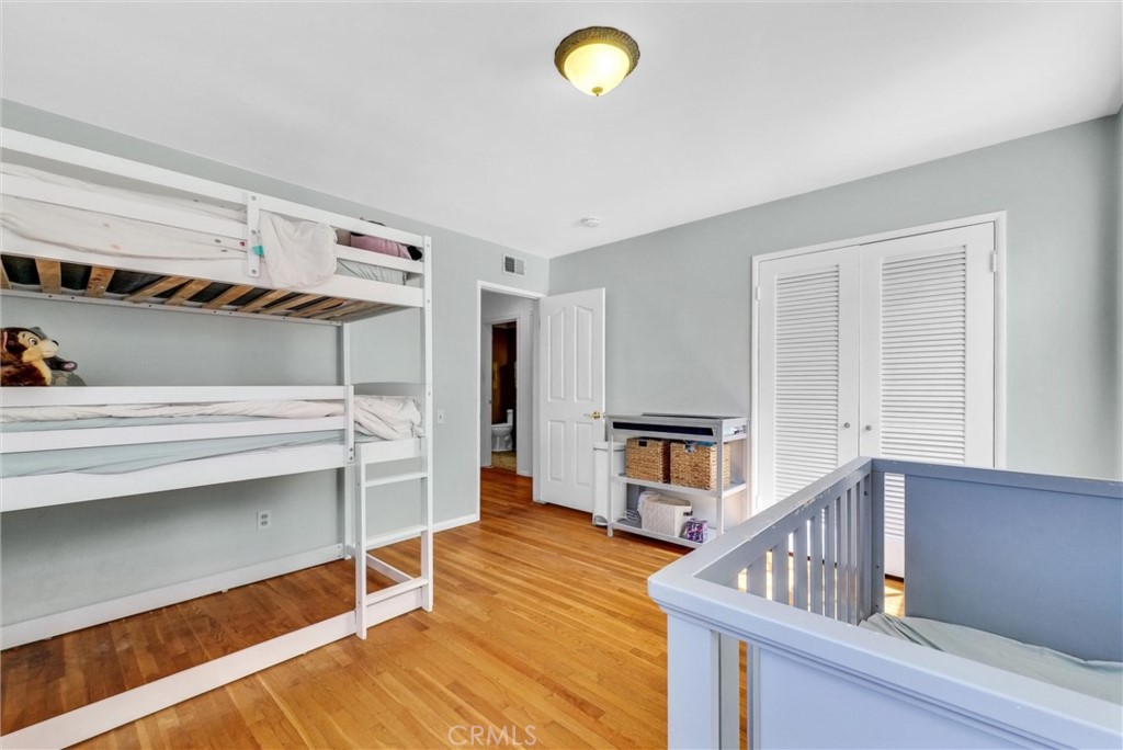 440 Cabrillo Street Costa Mesa, CA 92627 - Photo 22 of 36 a bedroom with furniture and a window