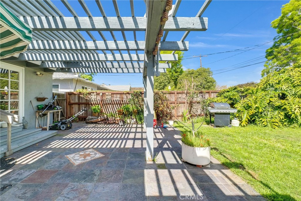 440 Cabrillo Street Costa Mesa, CA 92627 - Photo 30 of 36 a view of a patio with table and chairs and potted plants