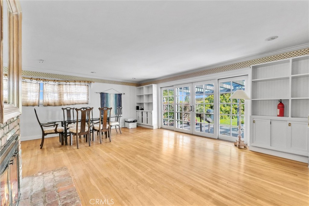 440 Cabrillo Street Costa Mesa, CA 92627 - Photo 7 of 36 a view of a dining room with furniture and a large window