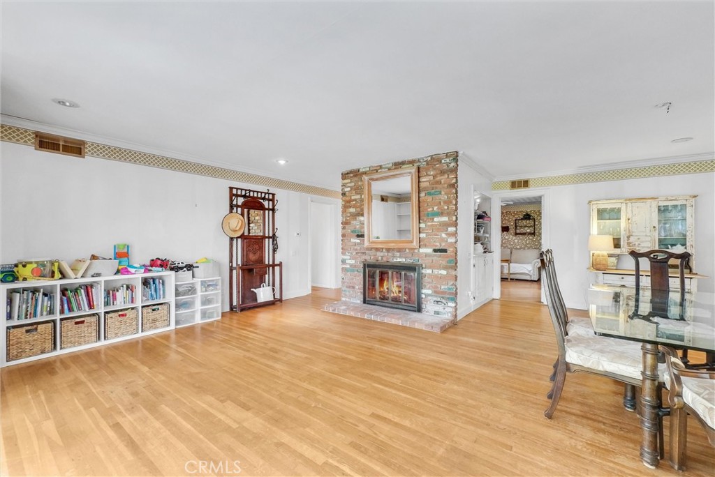440 Cabrillo Street Costa Mesa, CA 92627 - Photo 8 of 36 a living room with furniture and a wooden floor