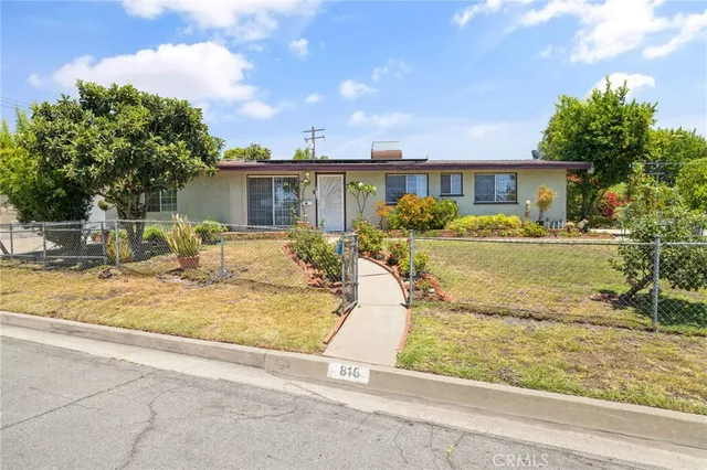 front view of a house with a patio