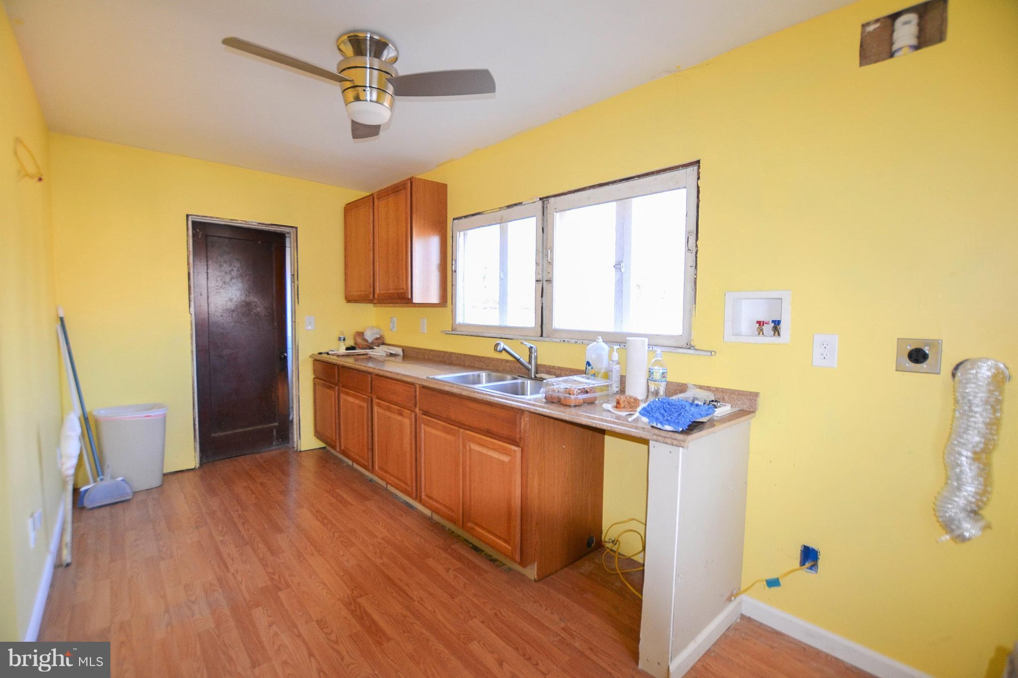 2802 Hollins Ferry Road Baltimore, MD 21230 - Photo 9 of 28 1st Floor Kitchen with Laundry