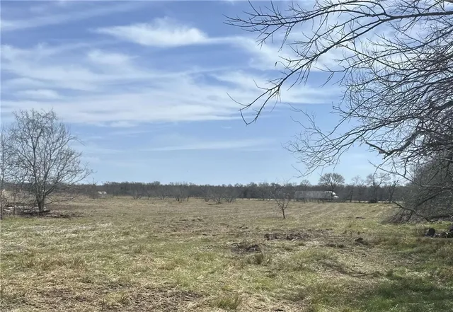 a view of lake with lots of green space