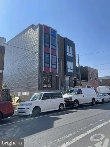 a car parked in front of a building
