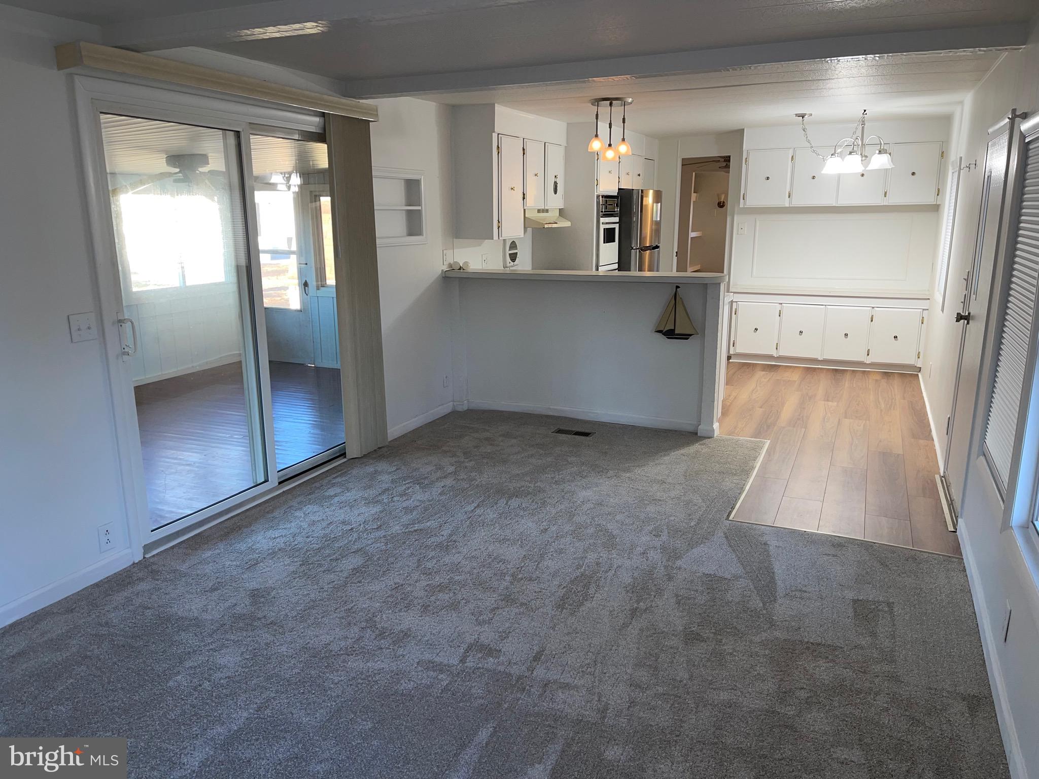 36907 Clubhouse Road Ocean View, DE 19970 - Photo 22 of 68 Brand New Floors and Carpets through out!