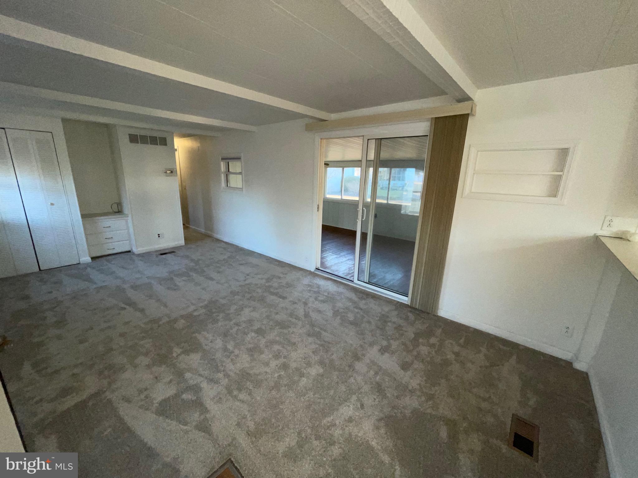 36907 Clubhouse Road Ocean View, DE 19970 - Photo 45 of 68 Living Room to closed in porch!