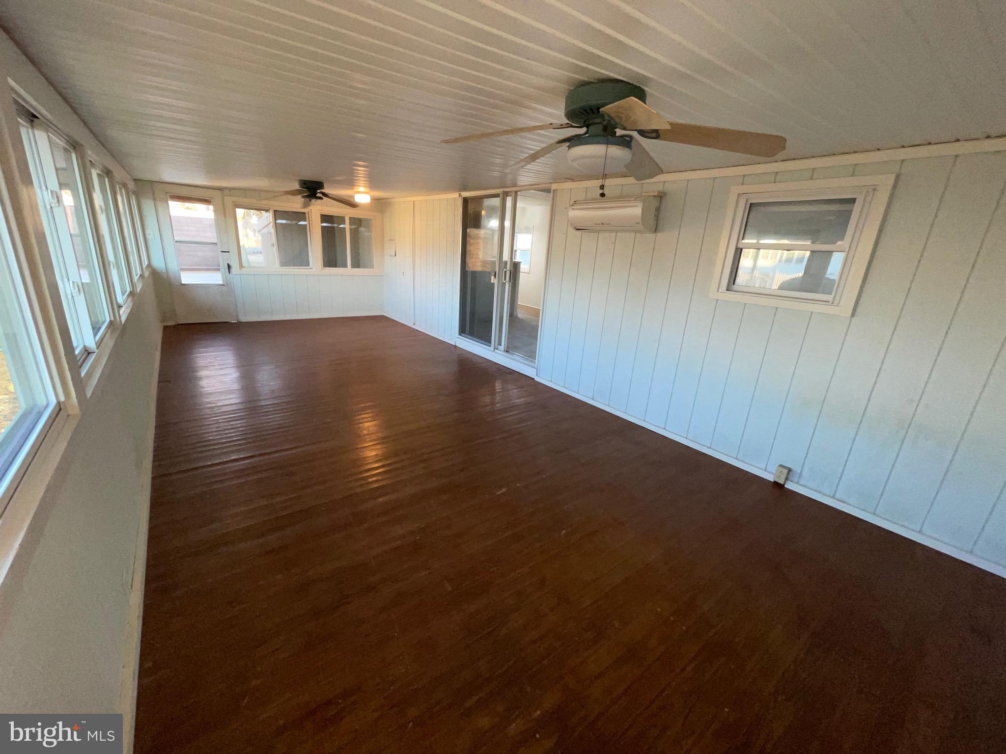 36907 Clubhouse Road Ocean View, DE 19970 - Photo 48 of 68 Gorgeous Porch for gatherings, crab feast? Games?