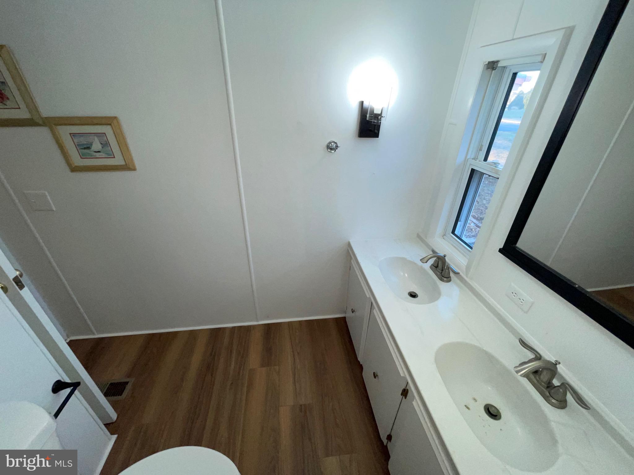 36907 Clubhouse Road Ocean View, DE 19970 - Photo 54 of 68 Double Sink in bathroom