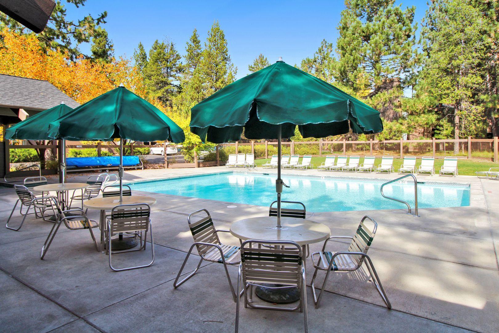 57407 Beaver Ridge Loop, Unit 44 Sunriver, OR 97707 - Photo 24 of 28 Pool patio tables