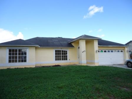 457 Southwest Aster Road Port St. Lucie, FL 34953 - Photo 1 of 23 Front
