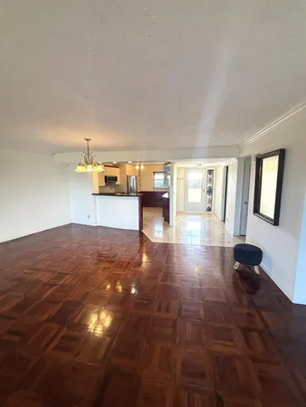 a view of a living room and dining room