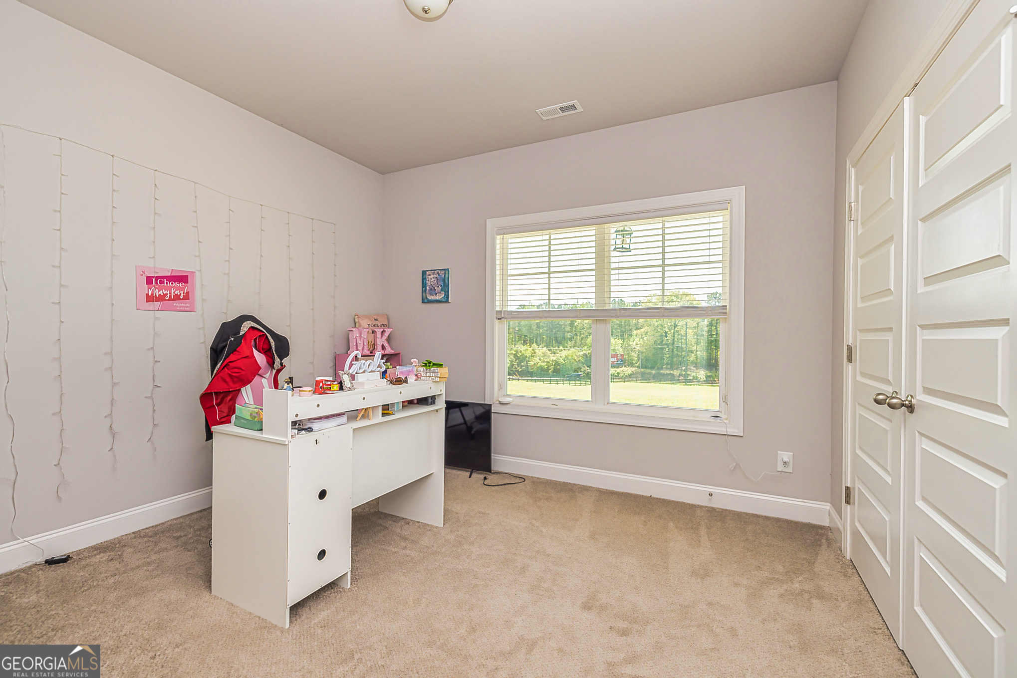 941 Highway 16 Newnan, GA 30263 - Photo 22 of 43 a utility room with baby toys
