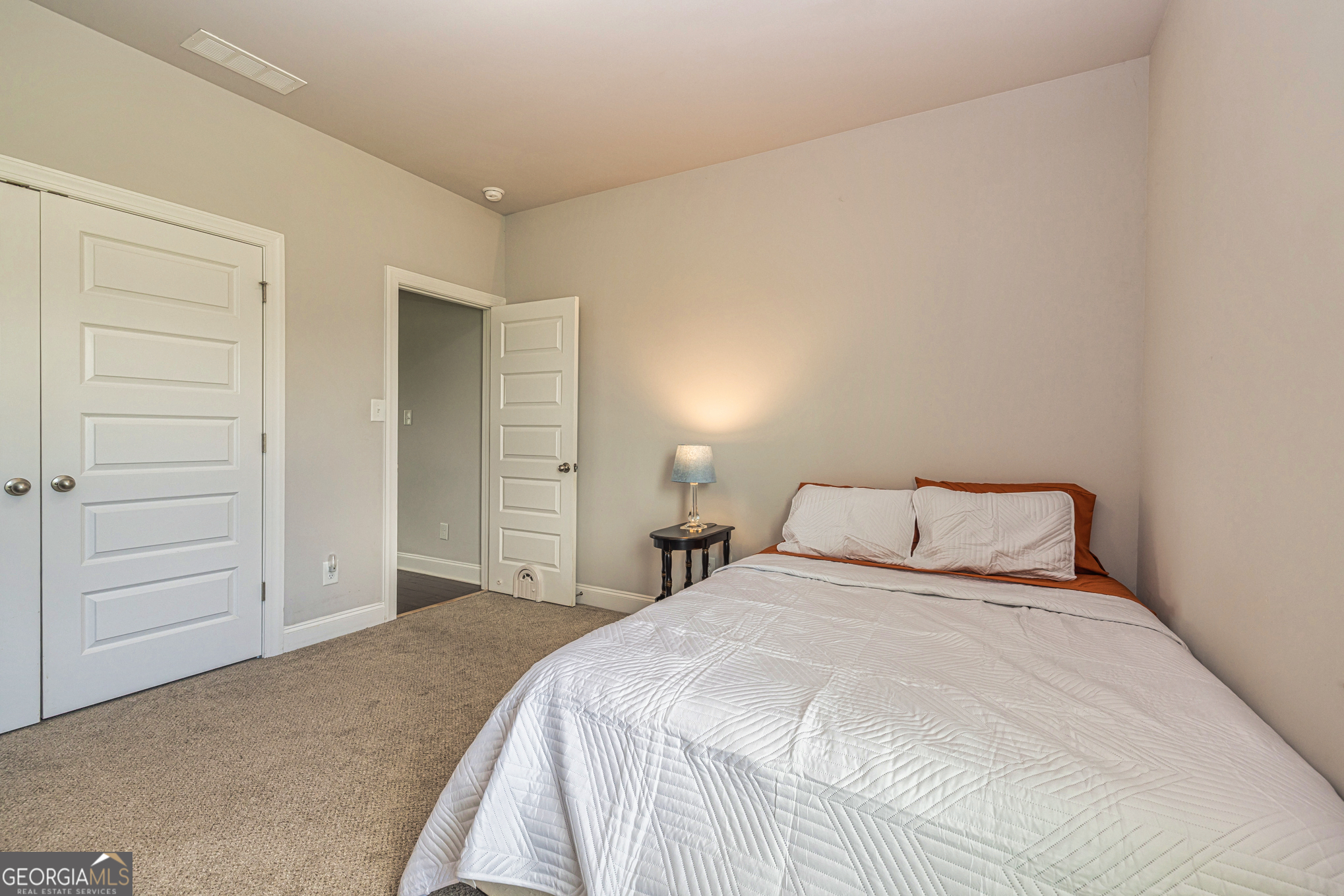 941 Highway 16 Newnan, GA 30263 - Photo 25 of 43 a bedroom with a bed and a closet