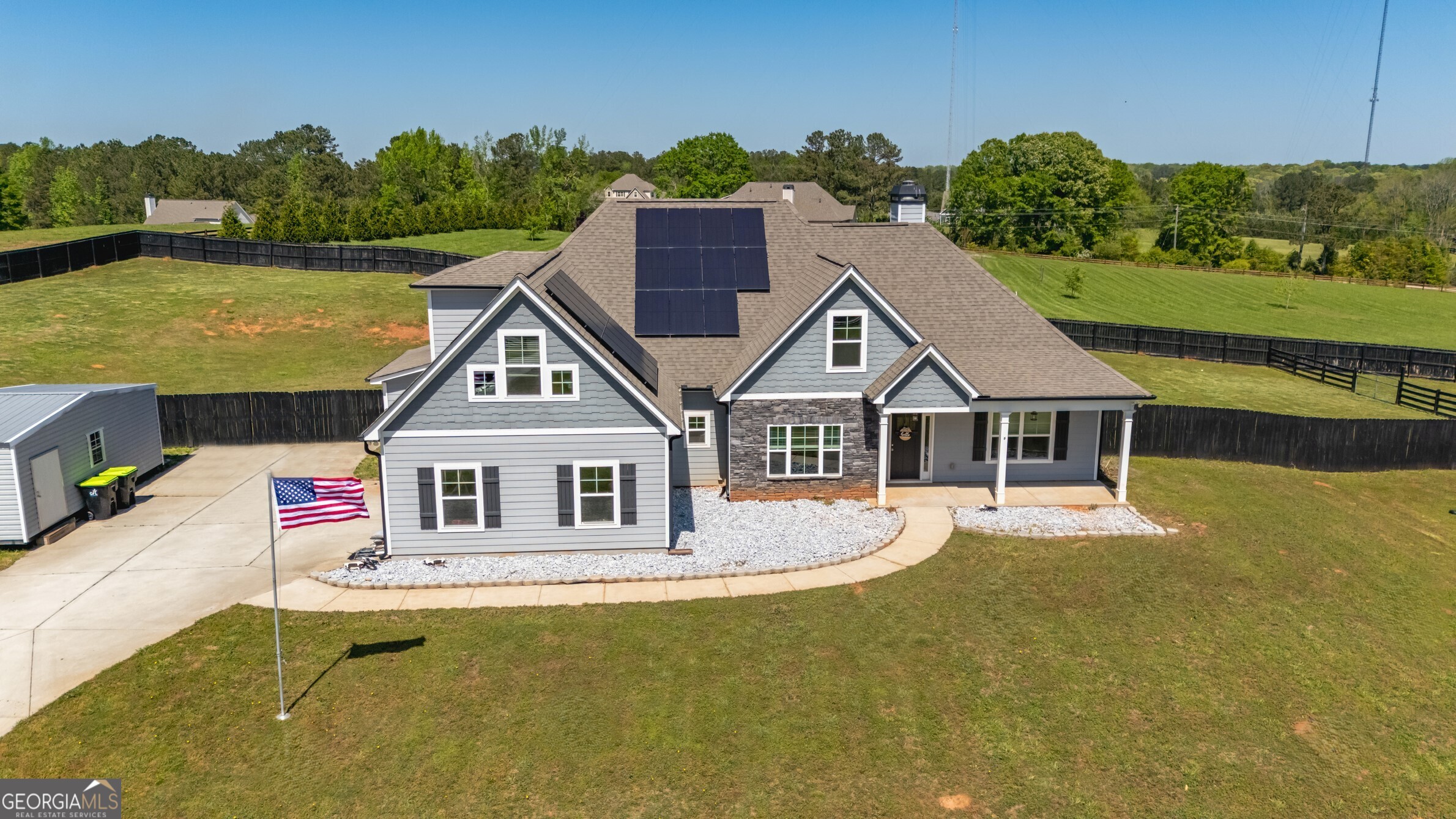 941 Highway 16 Newnan, GA 30263 - Photo 3 of 43 a house with swimming pool in front of it