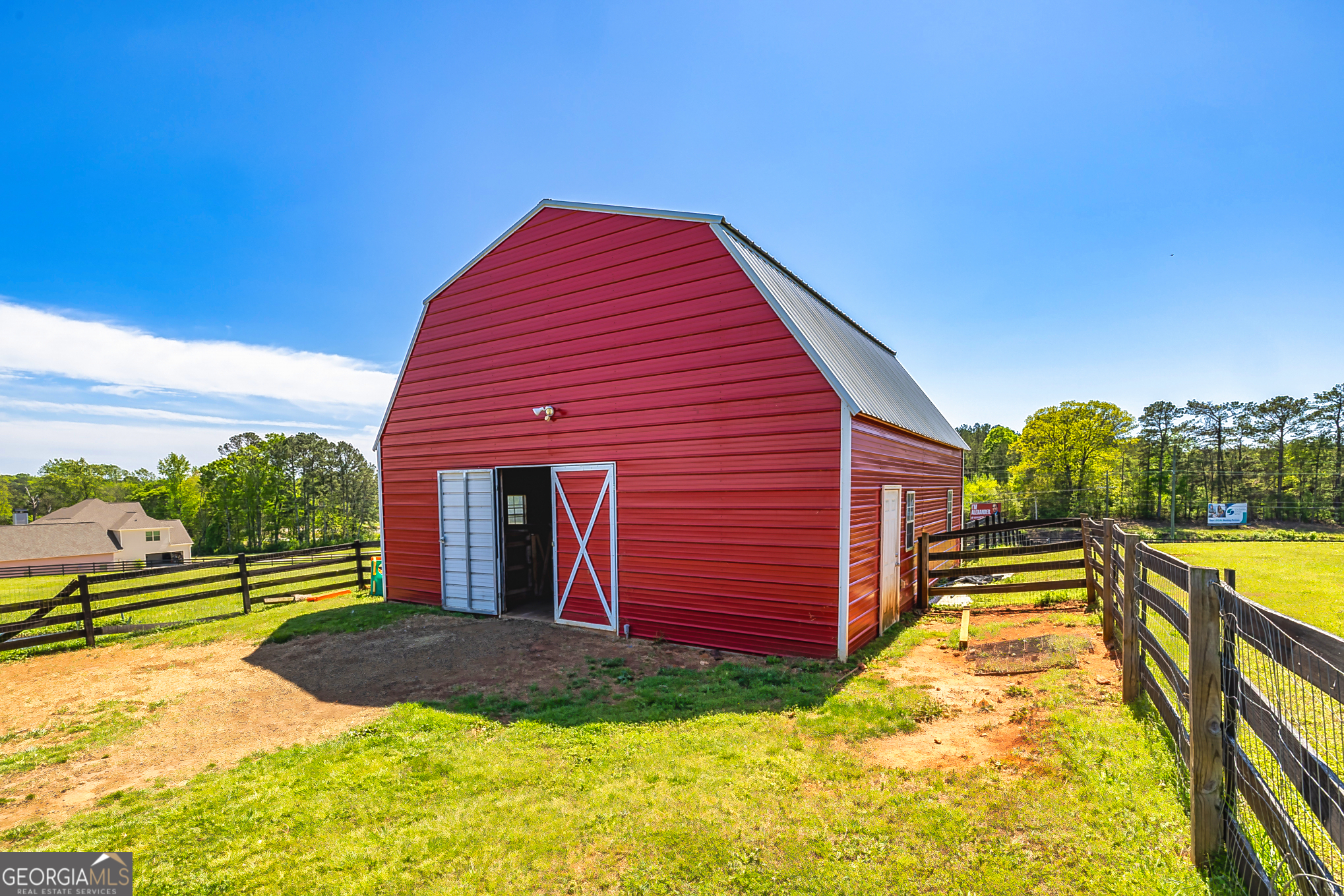 941 Highway 16 Newnan, GA 30263 - Photo 32 of 43 a view of a yard in front of a house with a small yard