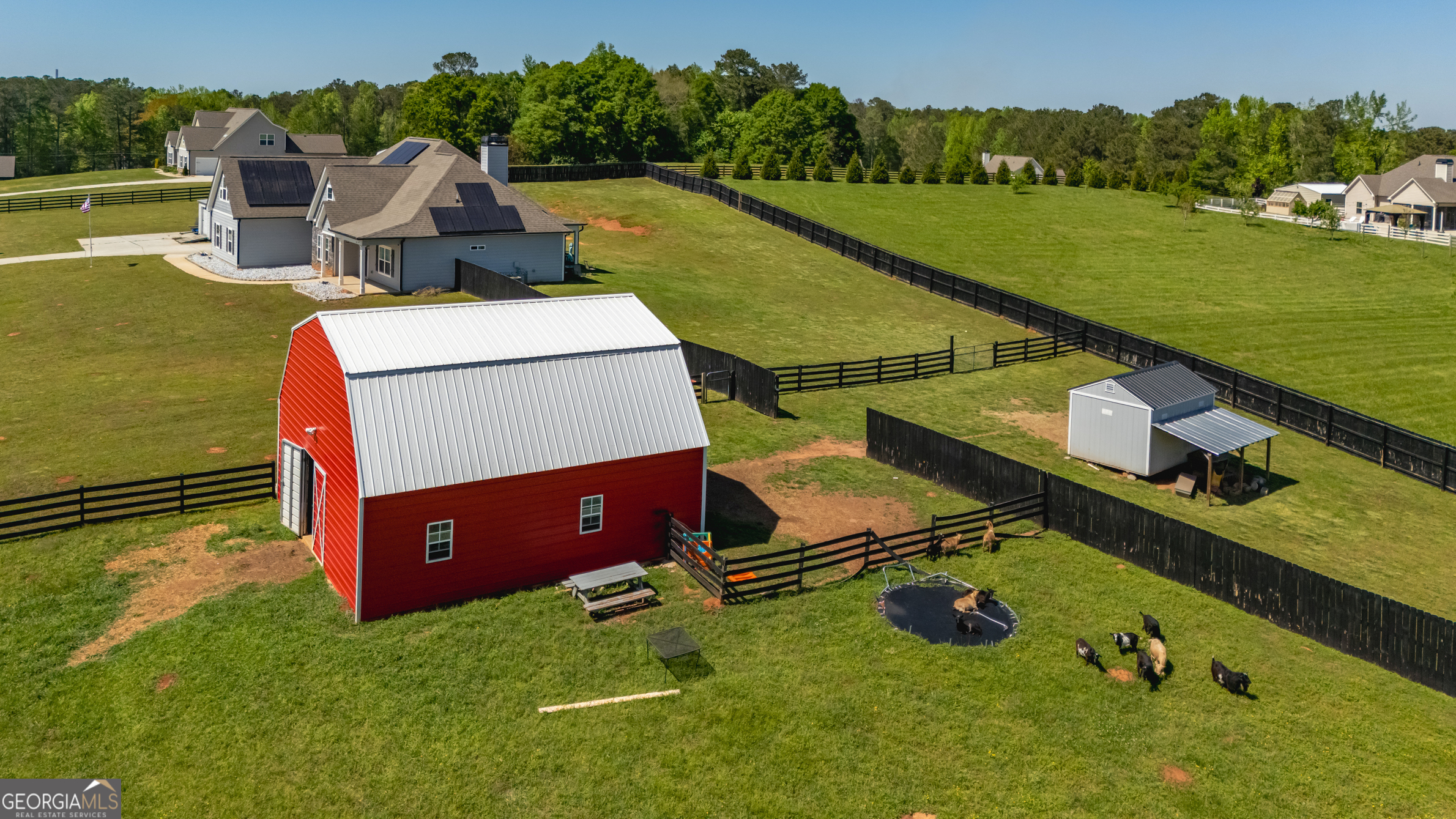 941 Highway 16 Newnan, GA 30263 - Photo 37 of 43 an aerial view of a house with yard