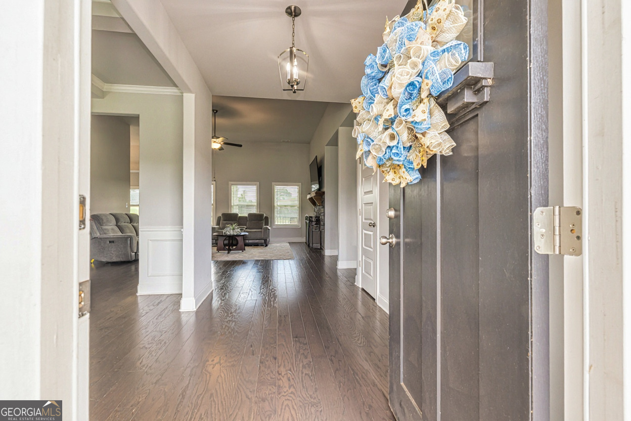 941 Highway 16 Newnan, GA 30263 - Photo 4 of 43 a view of entryway with livingroom and chandelier