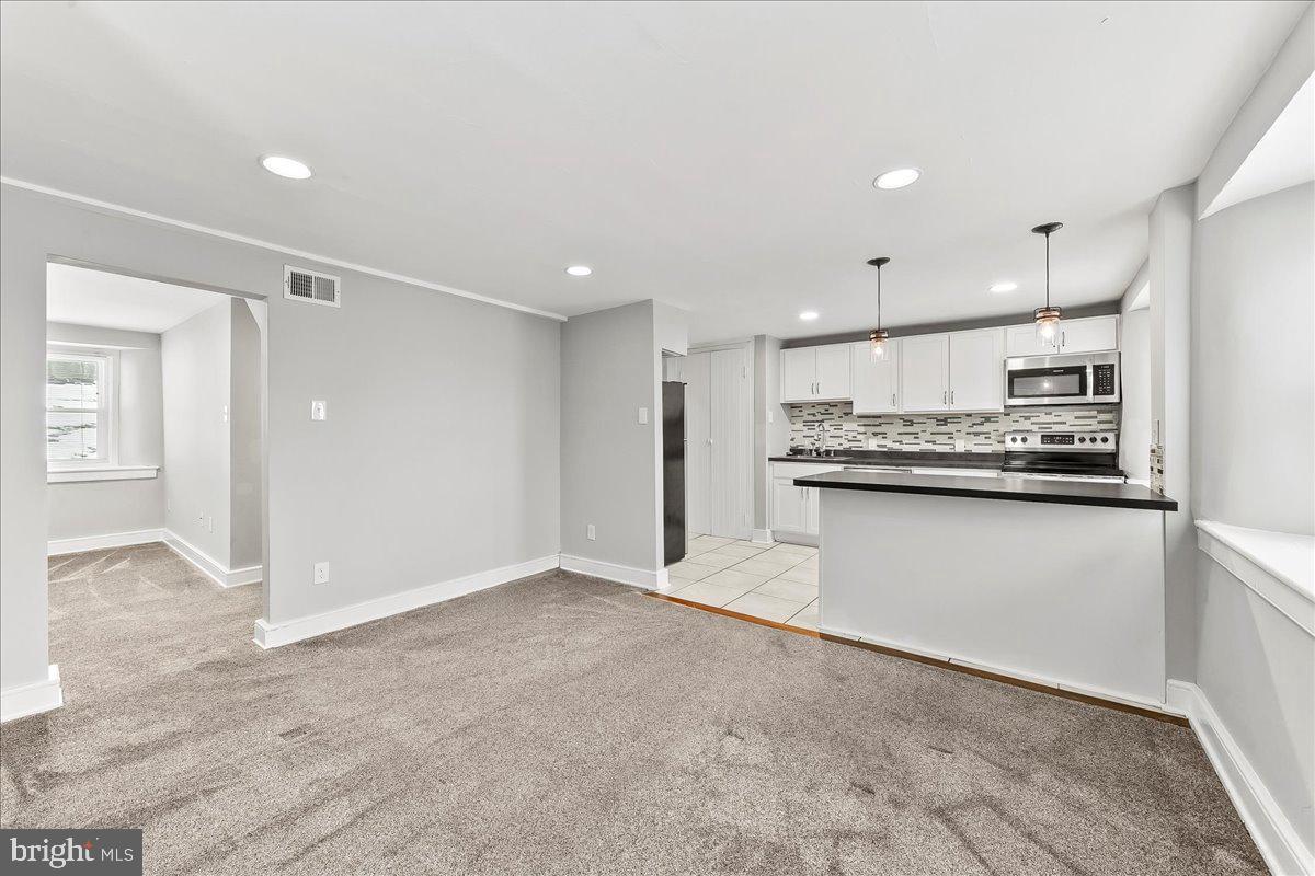 1050 Pike Springs Road, Unit 1058 Phoenixville, PA 19460 - Photo 7 of 20 Open great room