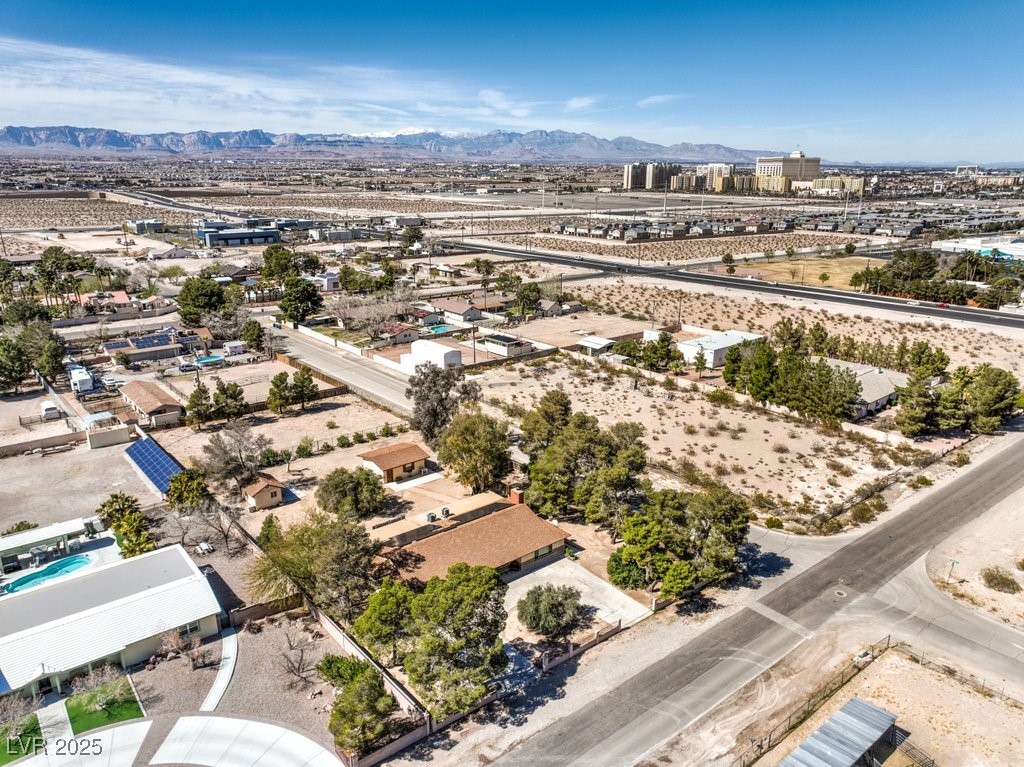 10615 Rancho Destino Road Las Vegas, NV 89183 - Photo 47 of 53 Birds eye view of property with a mountain view and a desert view