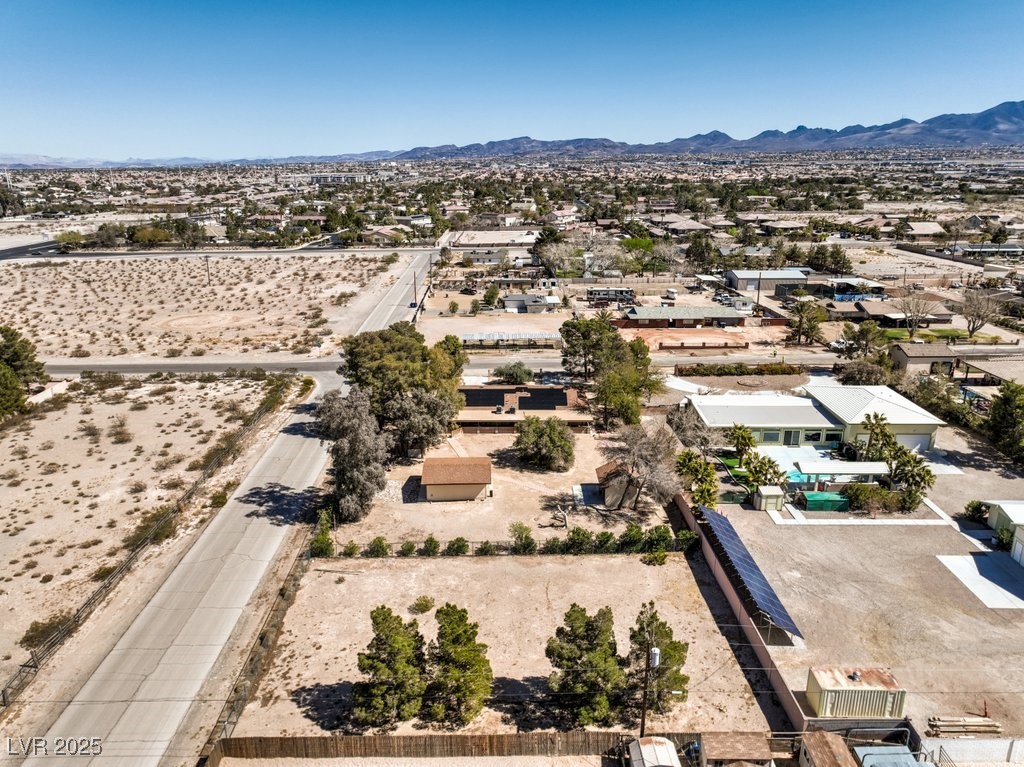 10615 Rancho Destino Road Las Vegas, NV 89183 - Photo 51 of 53 Aerial view featuring a mountain view and a desert view