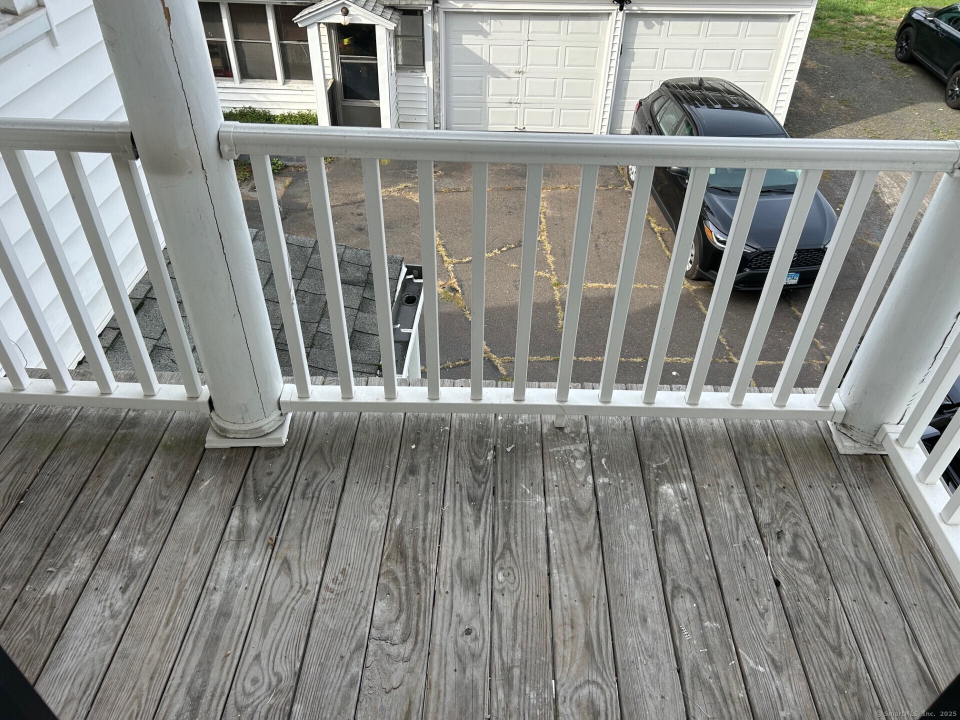 592 3rd Avenue West Haven, CT 06516 - Photo 12 of 14 a view of wooden balcony