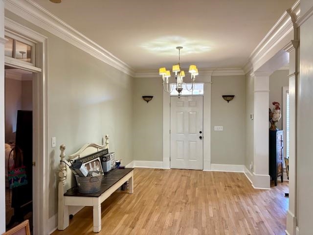 4310 Enoch Road Aynor, SC 29511 - Photo 5 of 39 Foyer featuring ornamental molding, a chandelier, and light wood-style flooring