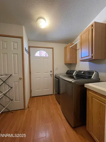 a kitchen with granite countertop a stove and a refrigerator