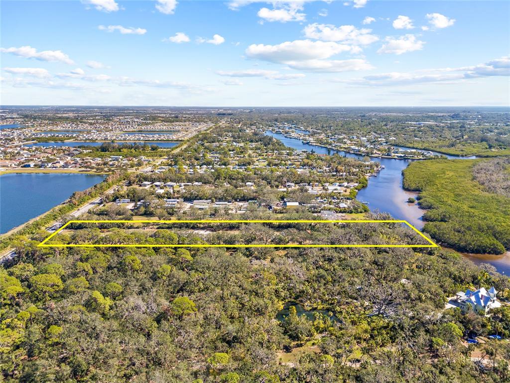 2312 West Shell Point Road Ruskin, FL 33570 - Photo 40 of 43 an aerial view of residential building and lake