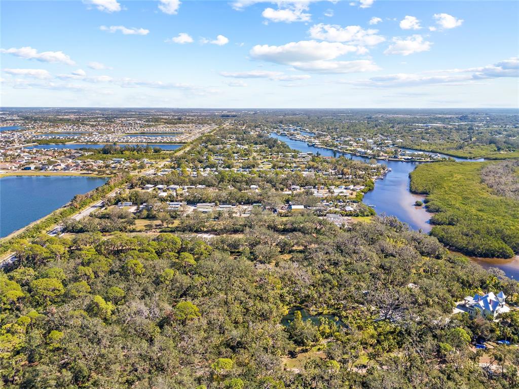 2312 West Shell Point Road Ruskin, FL 33570 - Photo 41 of 43 an aerial view of residential building with parking space