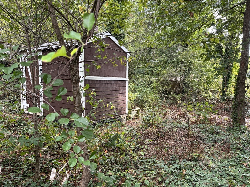 119 Lake Avenue Wareham, MA 02538 - Photo 6 of 11 a aerial view of a house with a yard