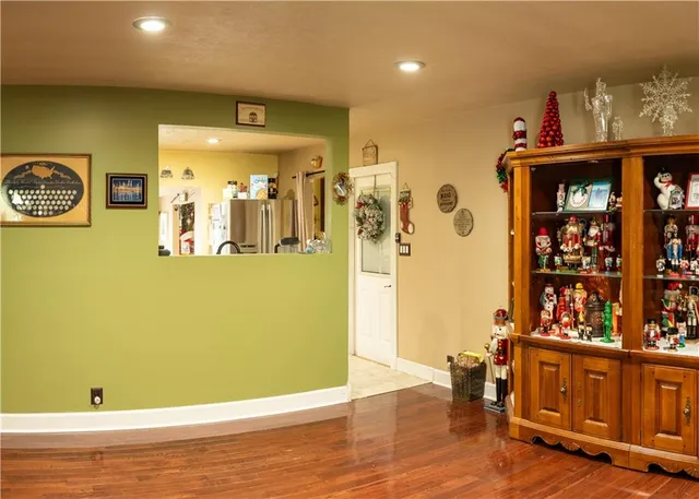 a view of a living room with natural light
